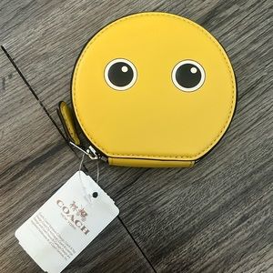 NWT Coach eyes round coin case